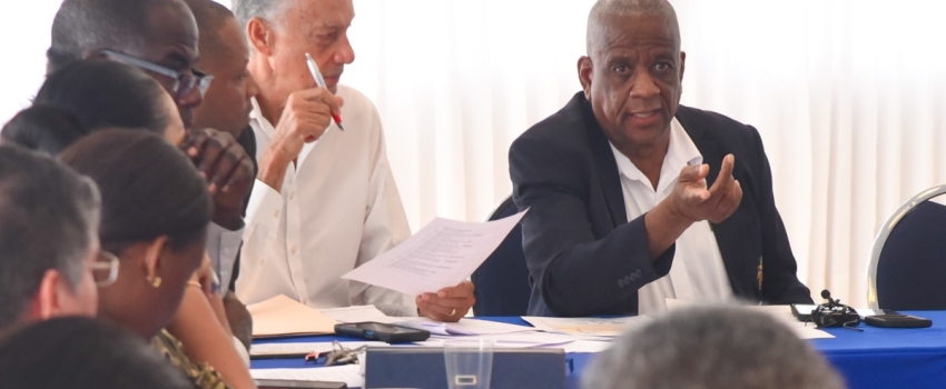 Minister of State in the Ministry of Agriculture, Fisheries and Mining,  Hon. Franklin Witter (right), addresses a meeting of the Bauxite Subcommittee of the Manchester Parish Development Committee (MPDC) held on Friday (October 27), at the Tropics View Hotel in Mandeville. Seated next to the Minister is Chairman of the MPDC,  Anthony Freckleton.