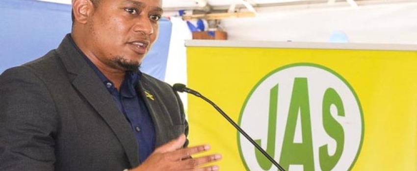 Minister of Agriculture, Fisheries and Mining, Hon. Floyd Green, addresses the launch of the Denbigh Agricultural, Industrial and Food Show today (June 21), at the Hi-Pro supercentre in St. Catherine.