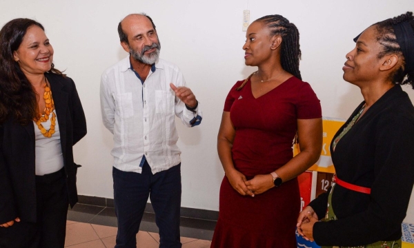 FAO representative for Jamaica, The Bahamas, and Belize, Dr Crispim Moreira (second left) makes a point during a conversation with (from left)  international consultant with the FAO, Dr Inessa Salomao; Junior Achievement Jamaica's Callia Smith-Harriott and the Ministry of Agriculture, Fisheries and Mining's St. Sanya Morrison. The occasion was a validation seminar for the "Inclusive and Resilient Agri-Food Systems in Rural and Peri-Urban Territories of Kingston project on Friday (October 6) at the Altamont 