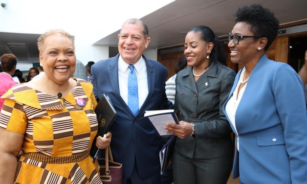 Hon. Audley Shaw (2nd left), Minister of Industry, Commerce, Agriculture and Fisheries, shares a light moment with (from left) Valerie Veira, Chief Executive Officer, Jamaica Business Development Corporation (JBDC); Avril Leonce, Director of SME Partnership and Development, and Audrey Tugwell, Executive Vice-President, Retail Banking, both of Scotiabank; at the opening ceremony of day one of the Employee Engagement Conference hosted by JBDC under the theme ‘Disturb. Reconnect. Engage’ at the Jamaica Confere