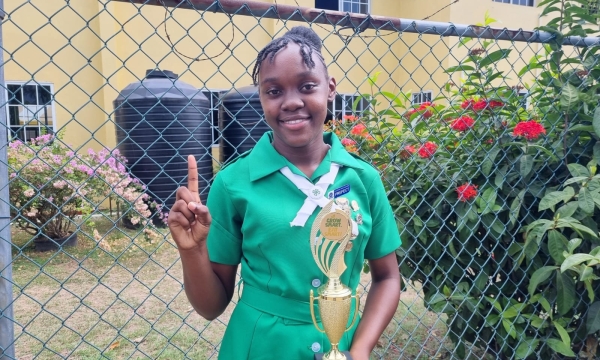 Jamaica 4-H Clubs National Girl of The Year, Natoya Williams, poses with her trophy at the National Achievement Expo held recently at the Denbigh Showground in Clarendon.