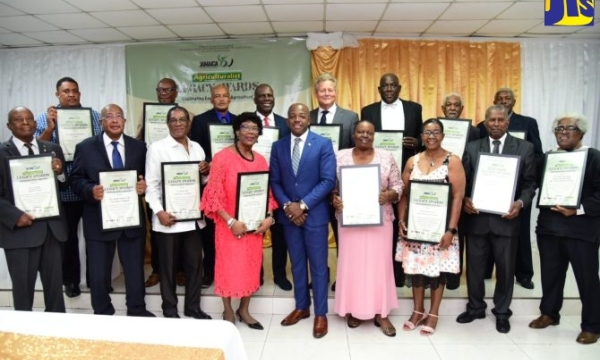 Minister of Agriculture and Fisheries, Hon. Pearnel Charles Jr. (centre, front row) is flanked by recipients of the Agricultural Legacy Awards during the ceremony held on Saturday (January 14) at the Medallion Hall Hotel, Kingston.