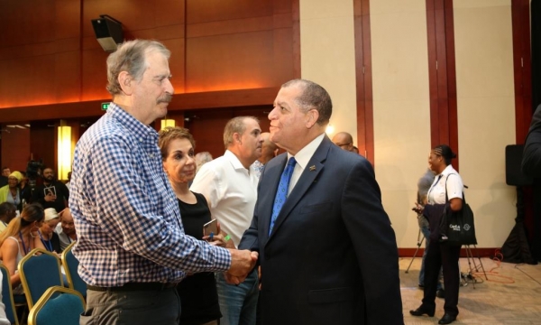 Hon. Audley Shaw (right), Minister of Industry, Commerce, Agriculture and Fisheries, greets Vicente Fox, former president of Mexico, at the 3rd Annual Global B2B Cannabis Conference & Expo, CanEx Jamaica, held at the Montego Bay Conference Centre on Friday, September 28, 2018.